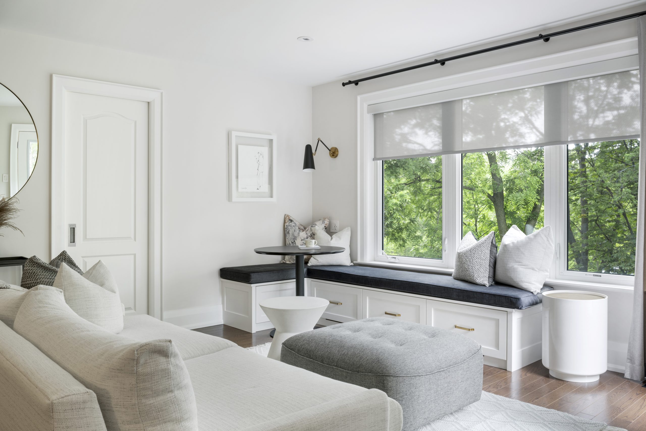 Stavebank Road bedroom sitting area with a window bench and neutral upholstery