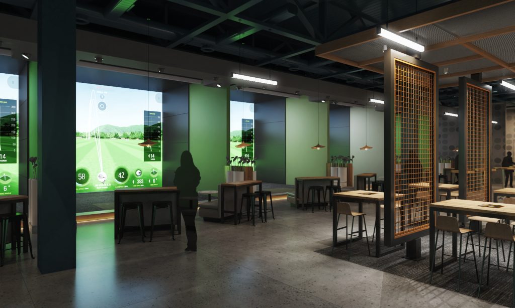 Golfplay lounge with indoor golf simulator bays and high-top seating