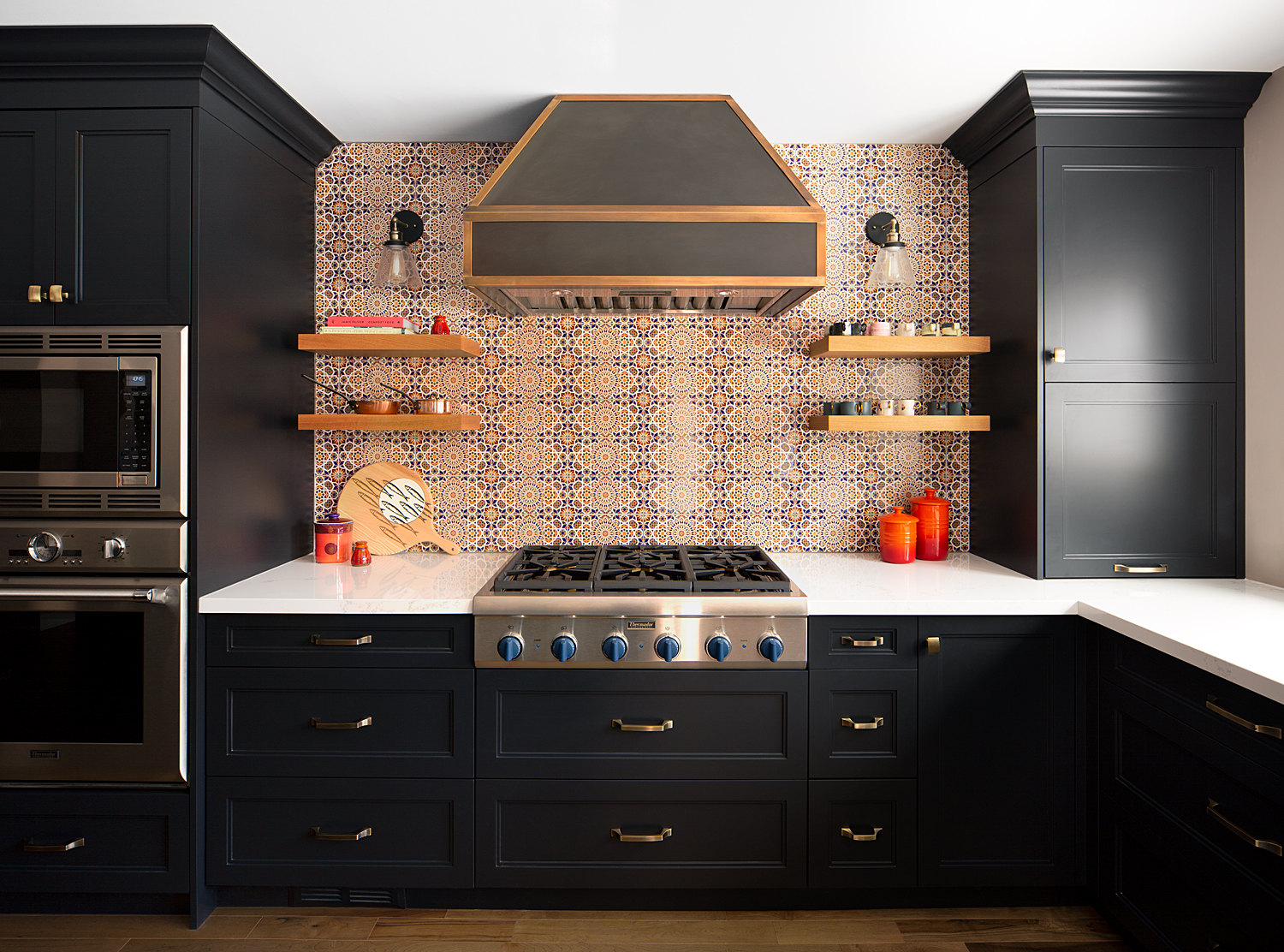 Marmac Crescent range wall with a custom hood and patterned tile backsplash